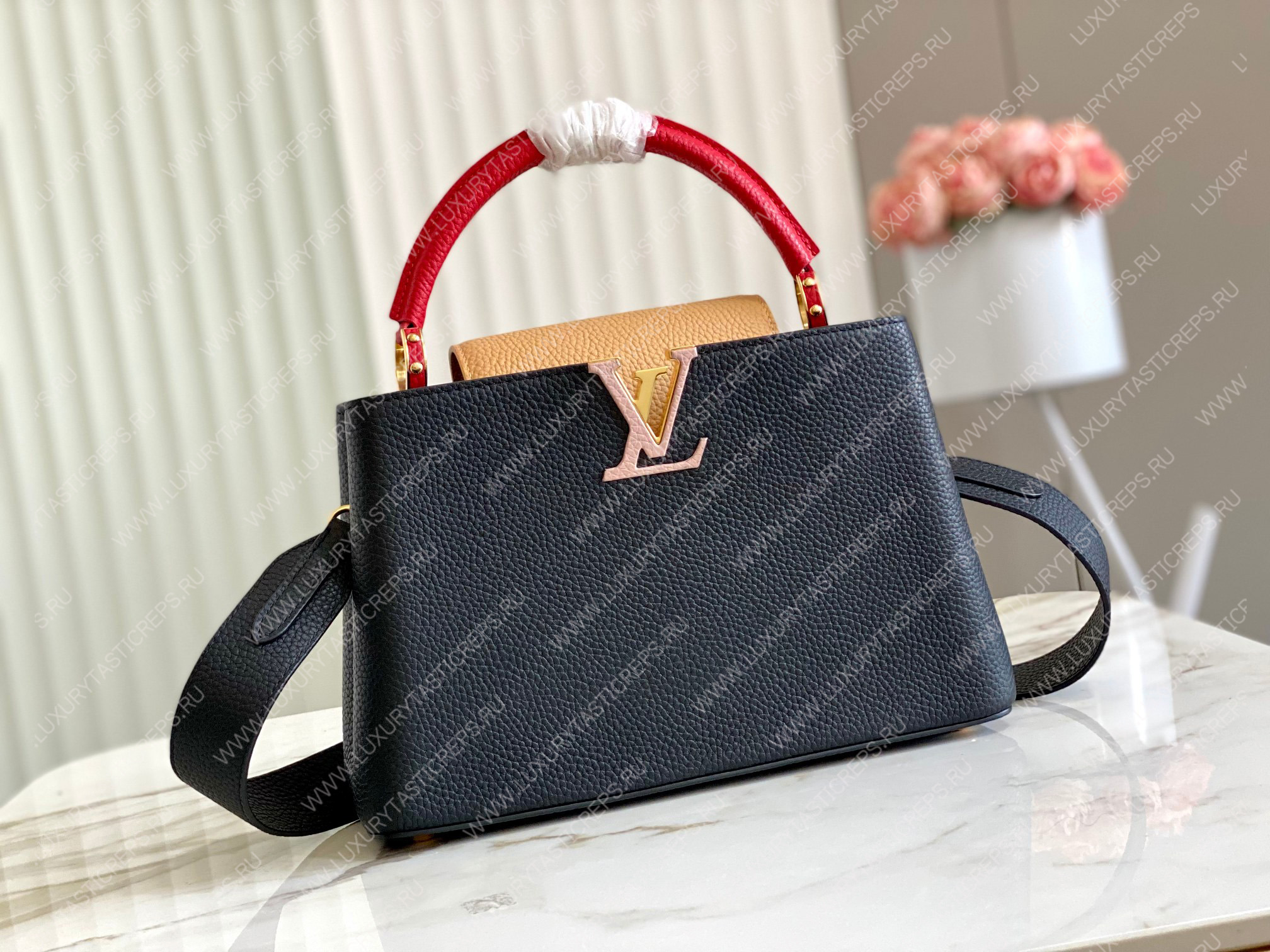 l**is V*t*n capucines mm black m20704