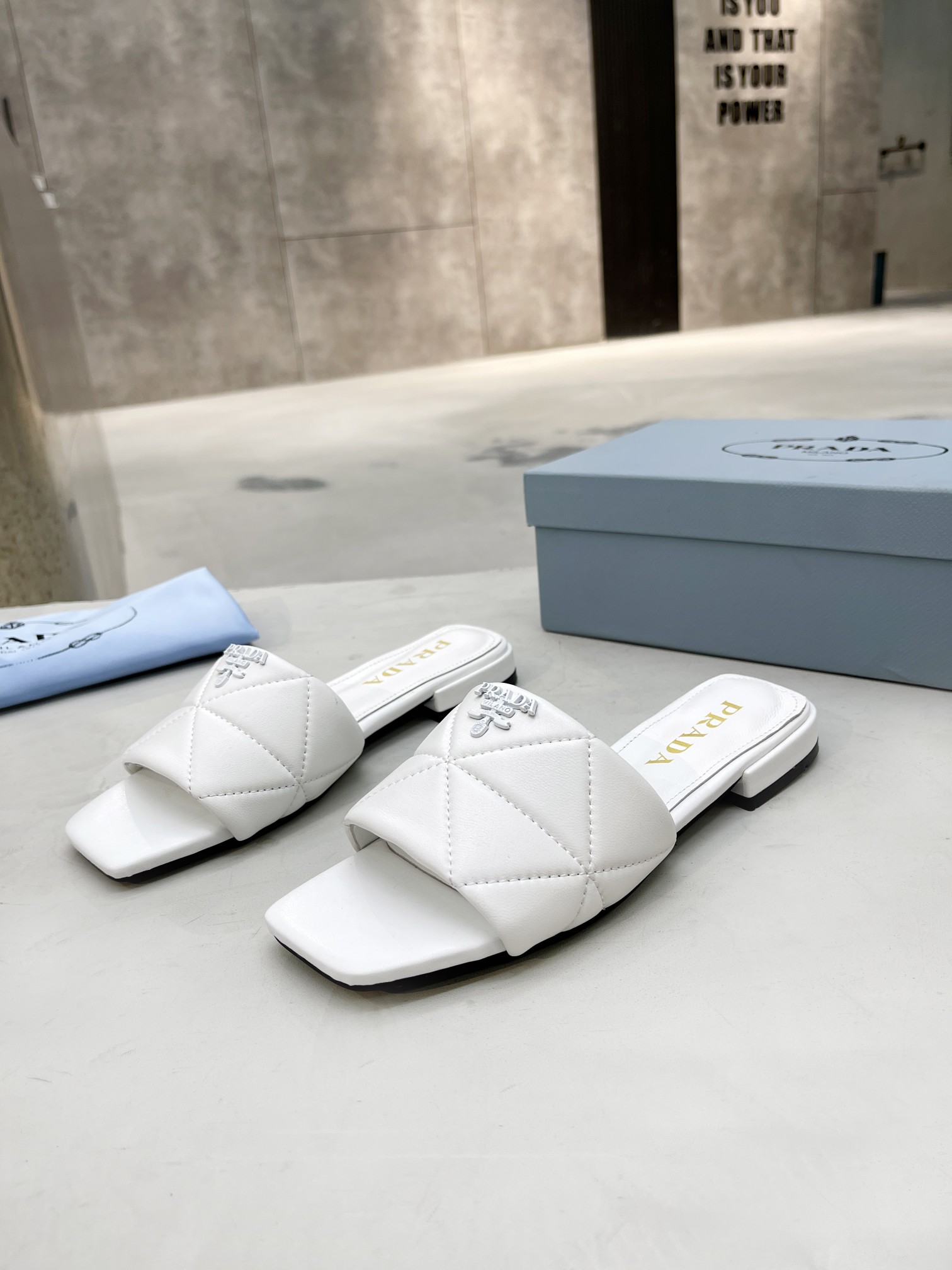 Pra*a quilted nappa leather sabots white 1xx583