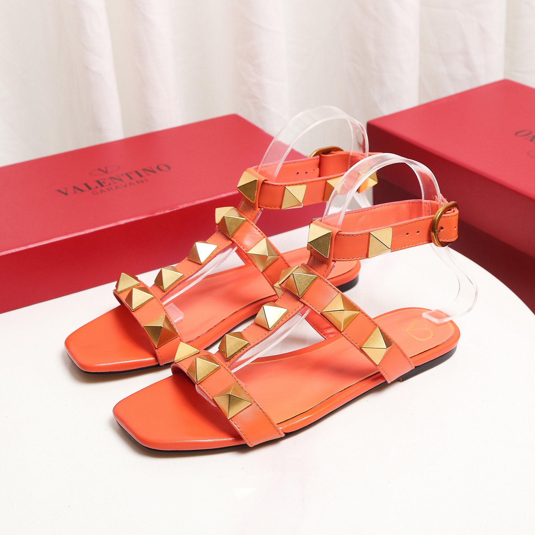 VALENTINO ROMAN STUD FLAT CALFSKIN SANDAL ORANGE 1W2S0BU8ZWM